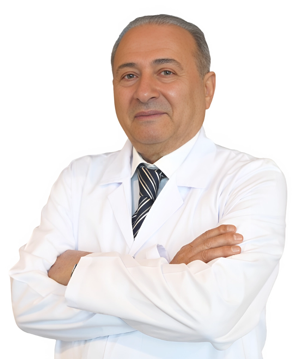 Portrait of Prof. Dr. Mustafa Taşkın, a General Surgery Specialist, in a professional medical environment.