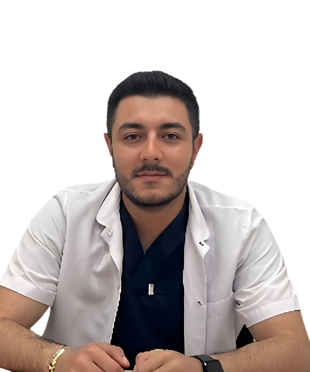 Portrait of Berat Salman, Hair Transplant Specialist, standing confidently in a clinical setting.