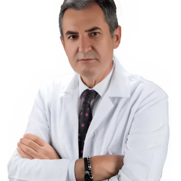 Portrait of Doç. Dr. Ali Durmuş, a General Surgery Specialist, standing in a professional medical environment.