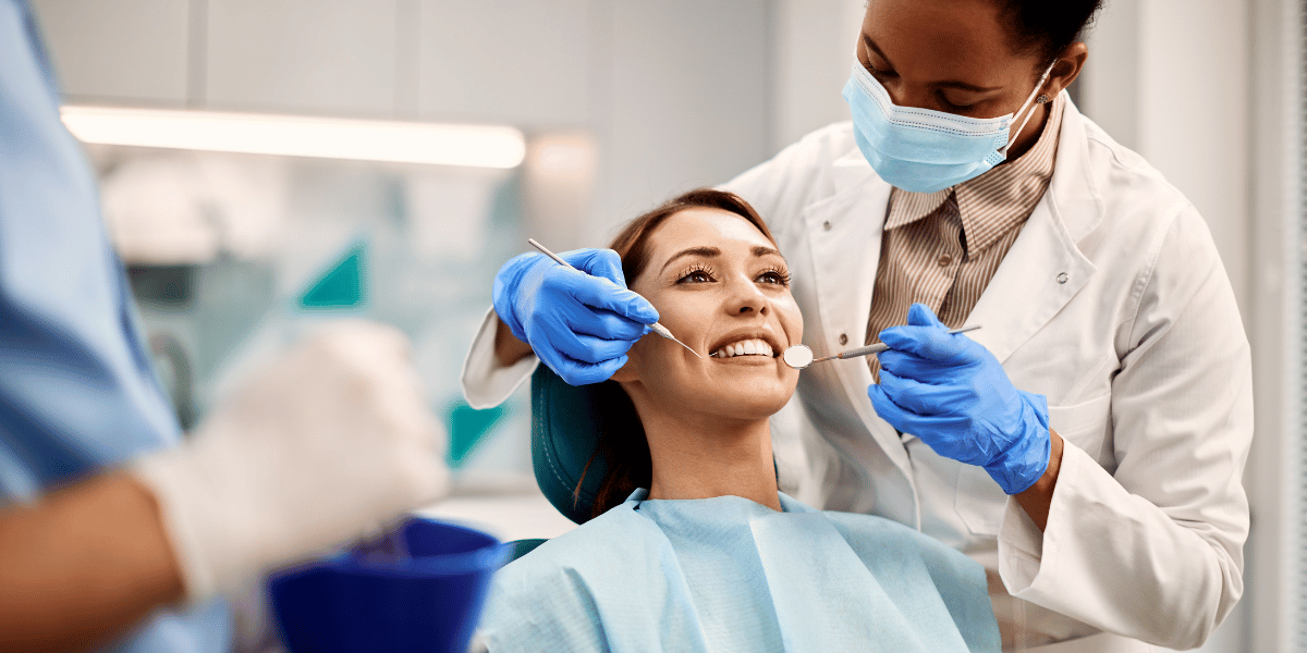 Vivid Clinic Dental Team: A group photo of the professional and friendly dental team at Vivid Clinic, ready to assist patients in achieving a beautiful and healthy smile with Porcelain Crowns.