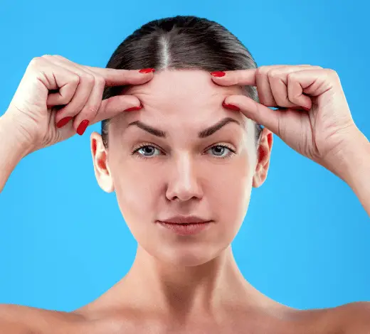 Patient Evaluating Forehead Lines