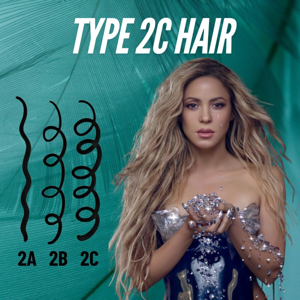 Shakira with her naturally thick and coarse waves, representing the beauty of Type 2C hair.