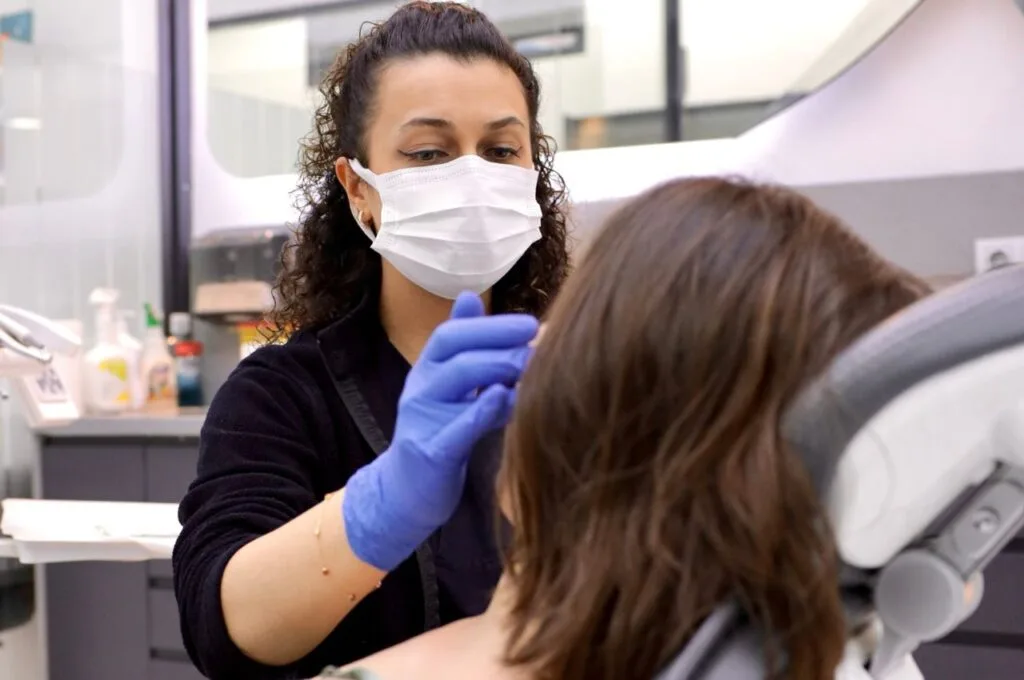 Modern dental section inside Vivid Clinic, featuring state-of-the-art dental equipment, comfortable patient chairs, and a professional treatment environment.